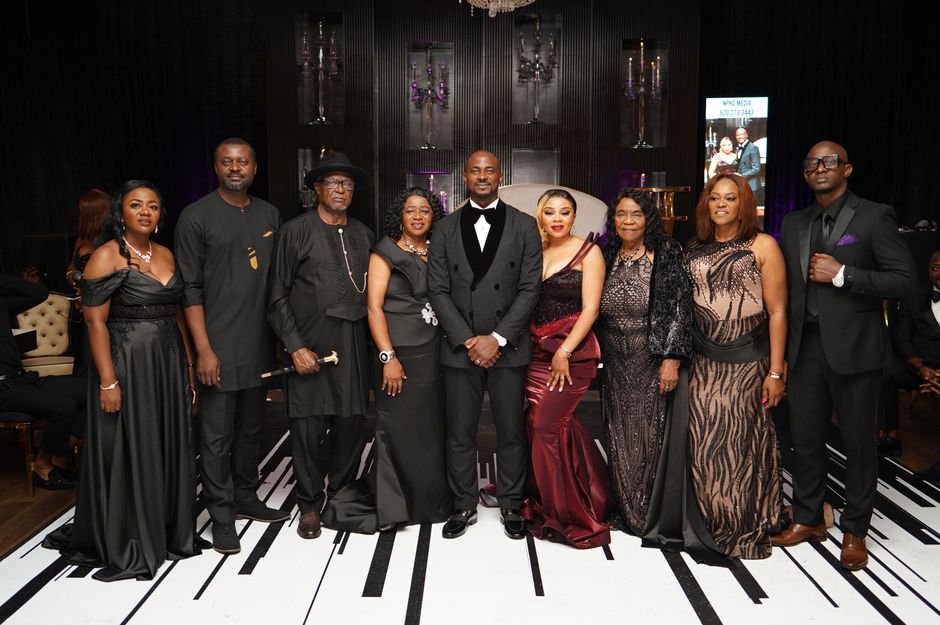 Elegant group of individuals dressed in formal attire at a sophisticated indoor event in Maryland City, Maryland.