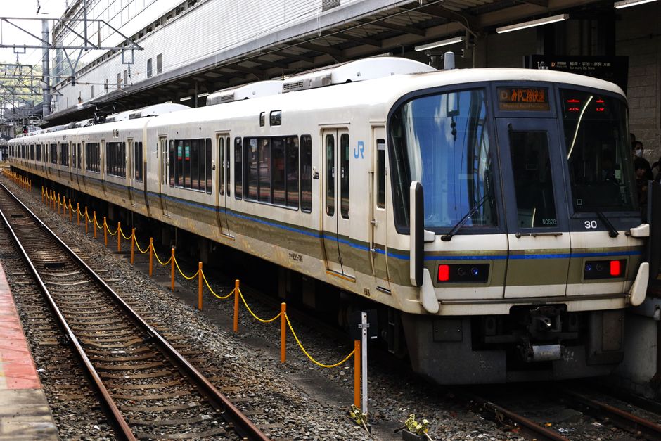 A Japanese commuter train at Kyoto Station in Japan, on the Nara Line.